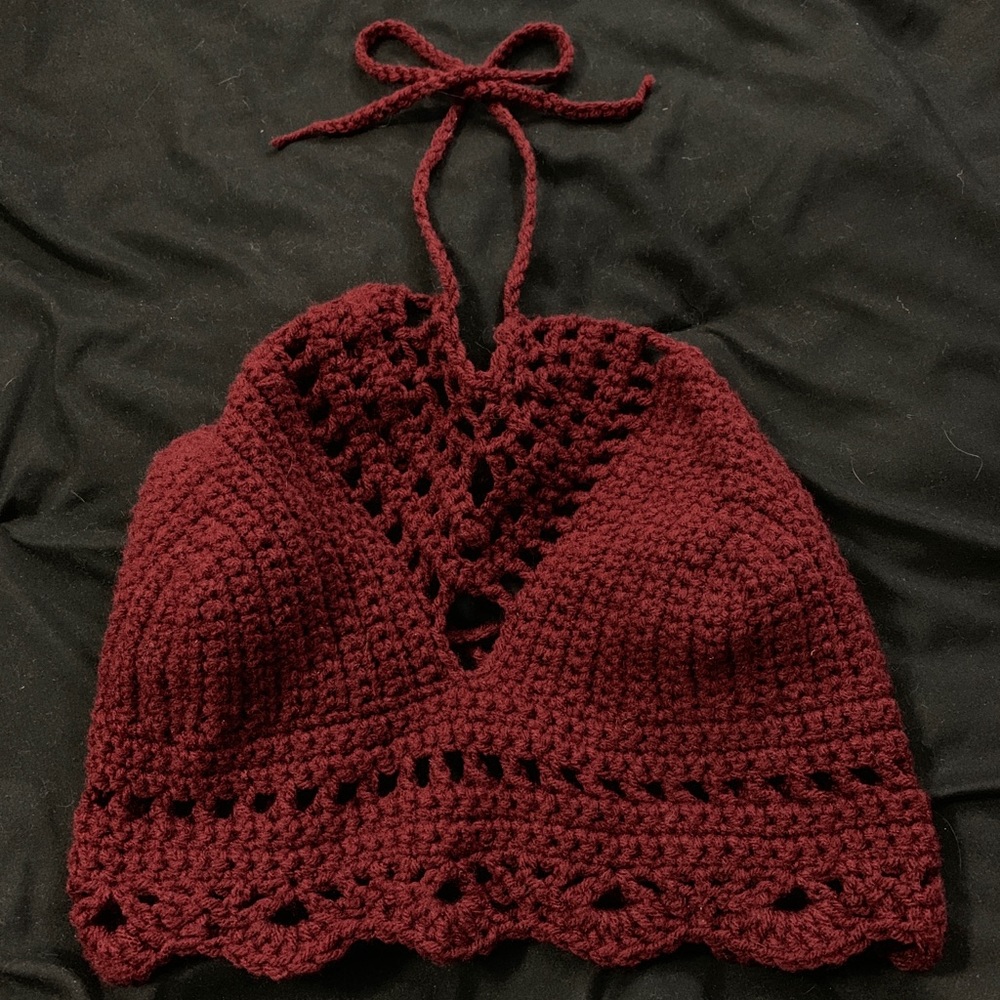 A dark berry crochet crop top